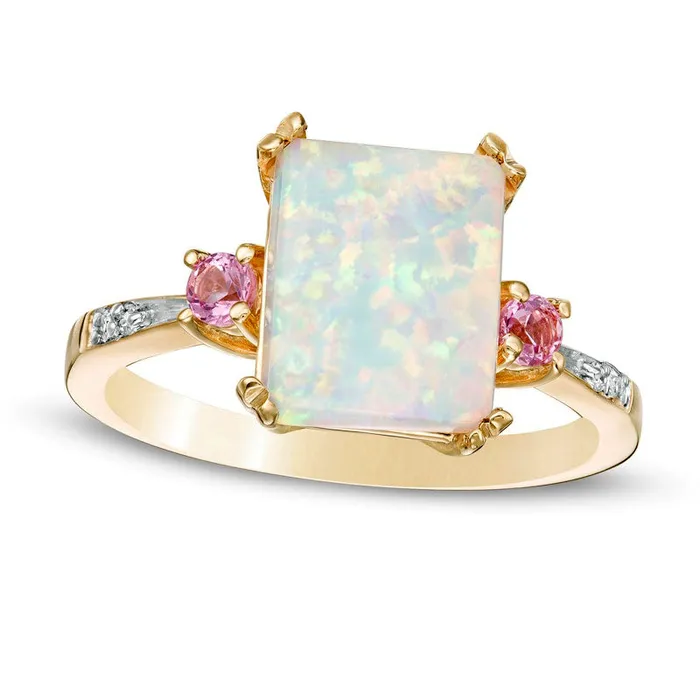 EmeraldCut LabCreated Opal and Pink Sapphire with Diamond Accent Three Stone Ring in Solid 10K Yellow Gold Goldia Rings EmeraldCut LabCreated Opal and Pink Sapphire with Diamond Accent Three Stone Ring in Solid 10K Yellow Gold Goldia Rings