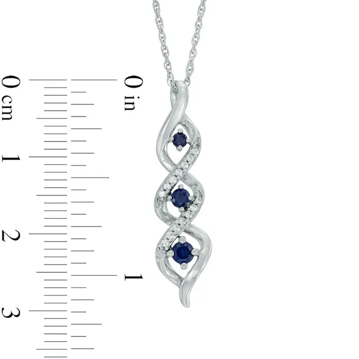 LabCreated Blue Sapphire and Diamond Accent Three Stone Pendant in Sterling Silver Goldia Necklaces LabCreated Blue Sapphire and Diamond Accent Three Stone Pendant in Sterling Silver Goldia Necklaces